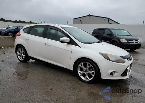 2014 Ford Focus Titanium from USA, damaged, VIN 1FADP3N2XEL459394